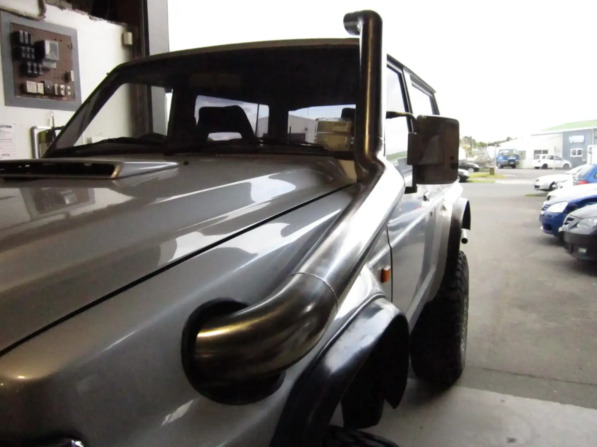 Custom stainless steel snorkel and roll bar for ute