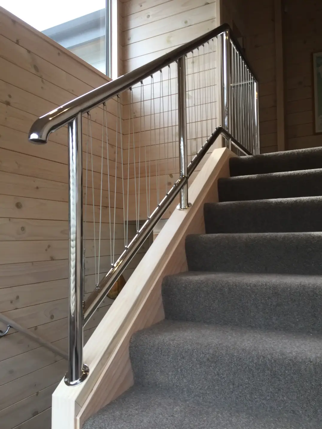 Stainless steel wire infill balustrade on residential staircase