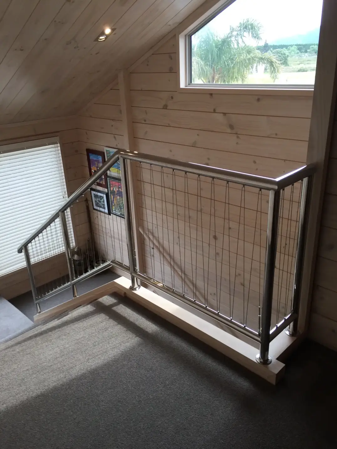 Wire infill stainless balustrade in residential interior