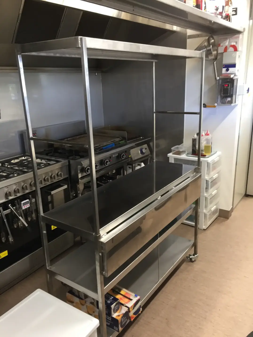 Stainless steel commercial kitchen equipment stand with canopy