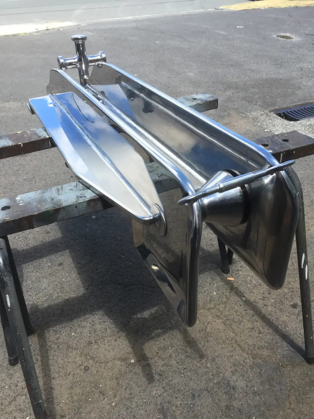 Polished stainless steel boat anchor roller and bowsprit