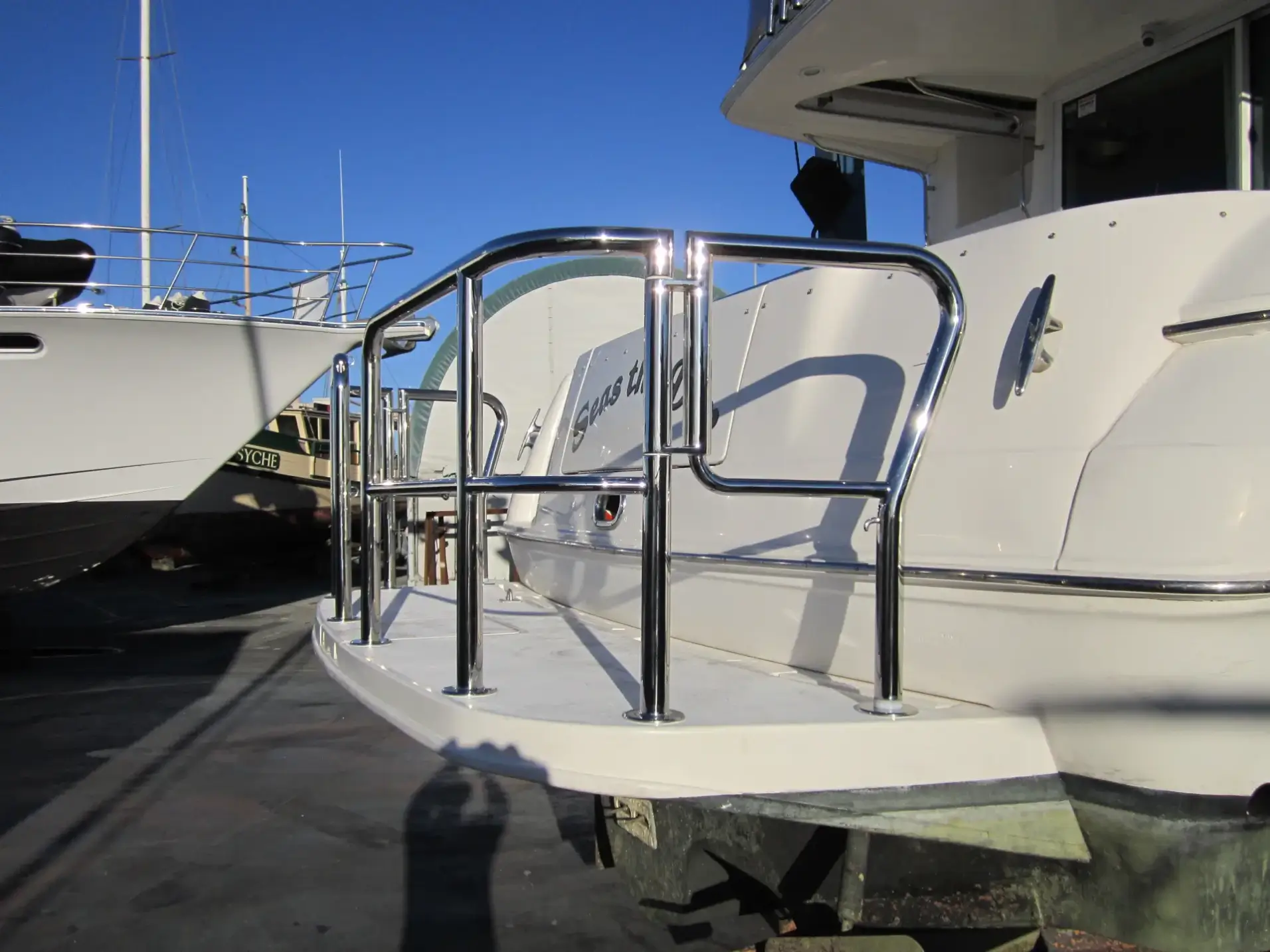 Stainless steel boat transom safety rail with gate