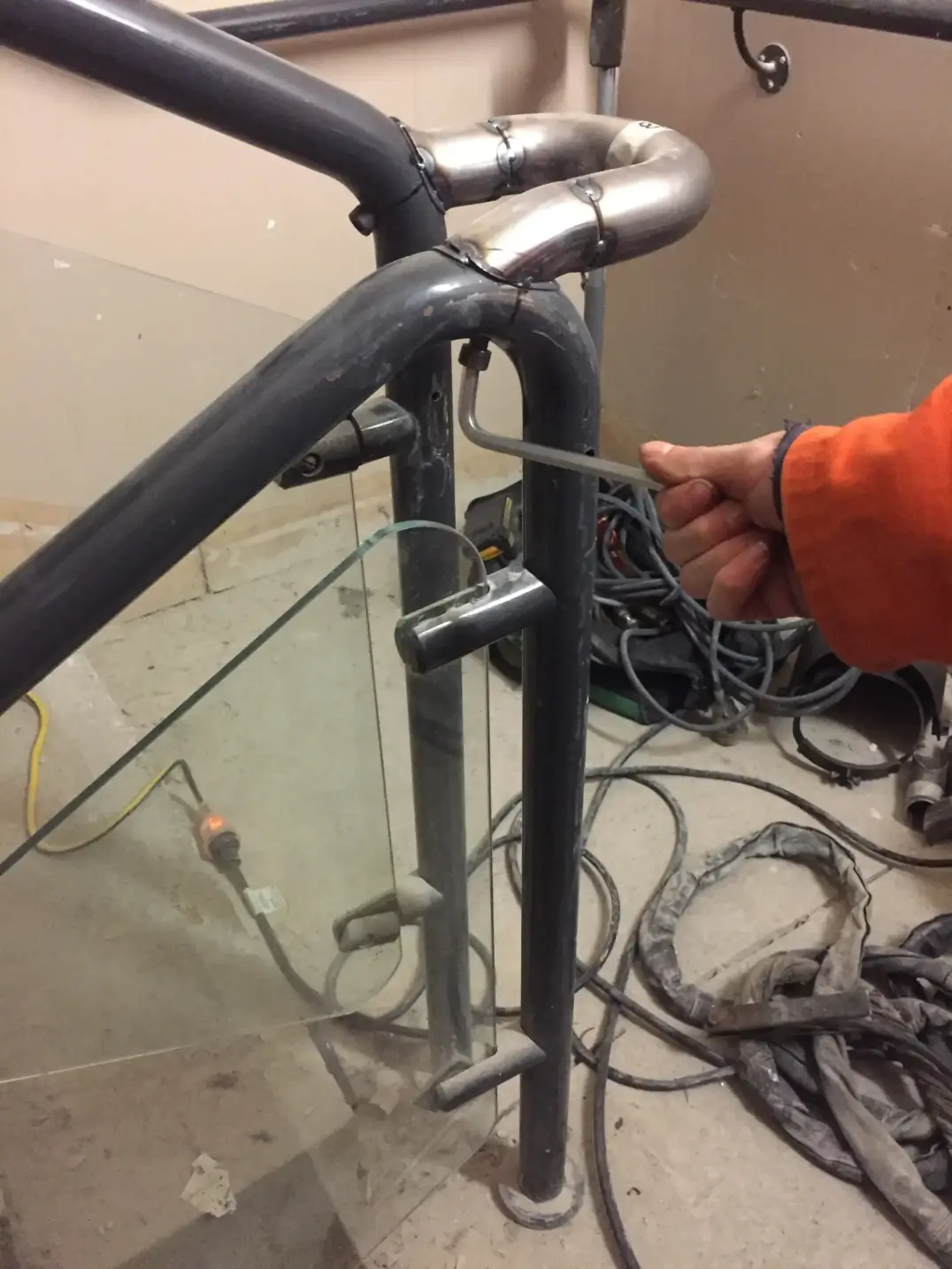 Custom steel handrail post fabrication in workshop