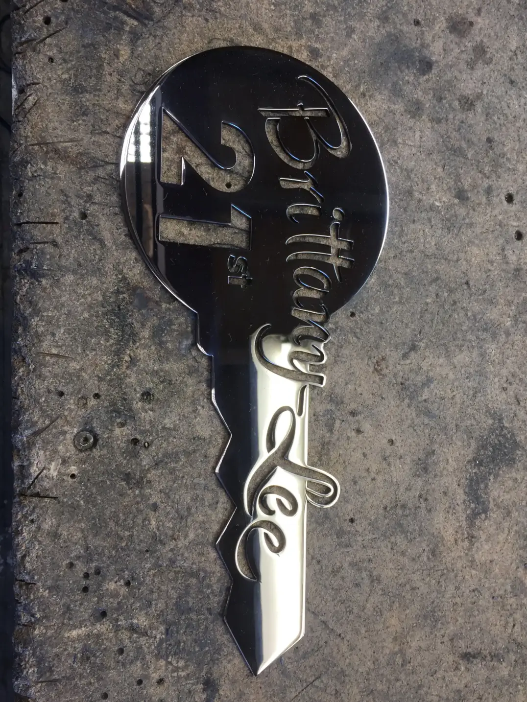 Custom laser cut stainless steel key shaped sign